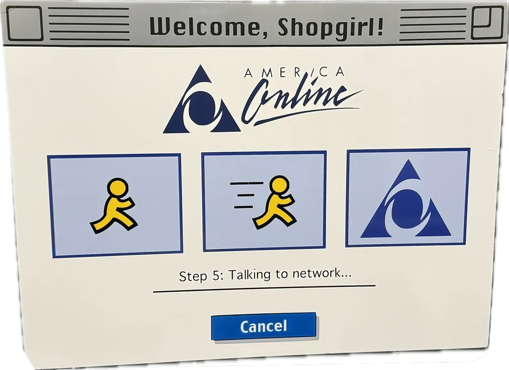 A hand-built prop of a 1990s dial-up software window reading Welcome, Shopgirl, made as part of a Halloween costume.